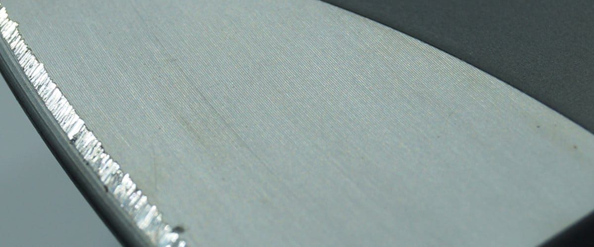 Beschädigte Alufelge vor der Reparatur
